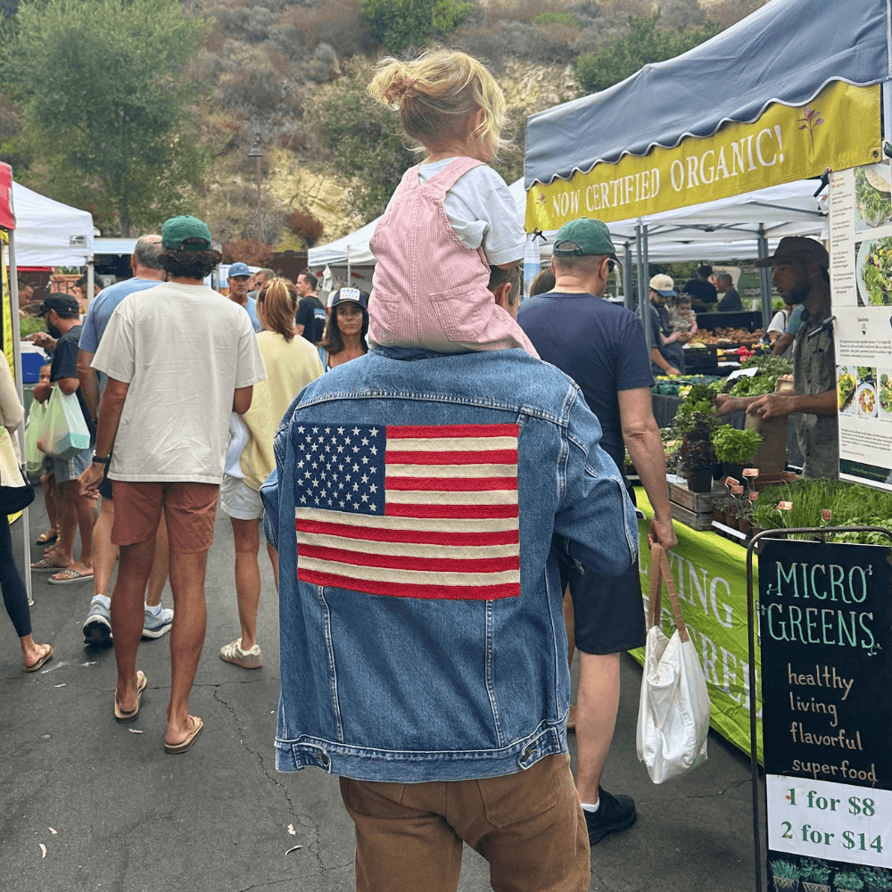 Marco Carralero with his family at the farmers market